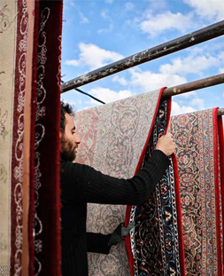 خشک کردن قالی در قالیشویی طلاب قم